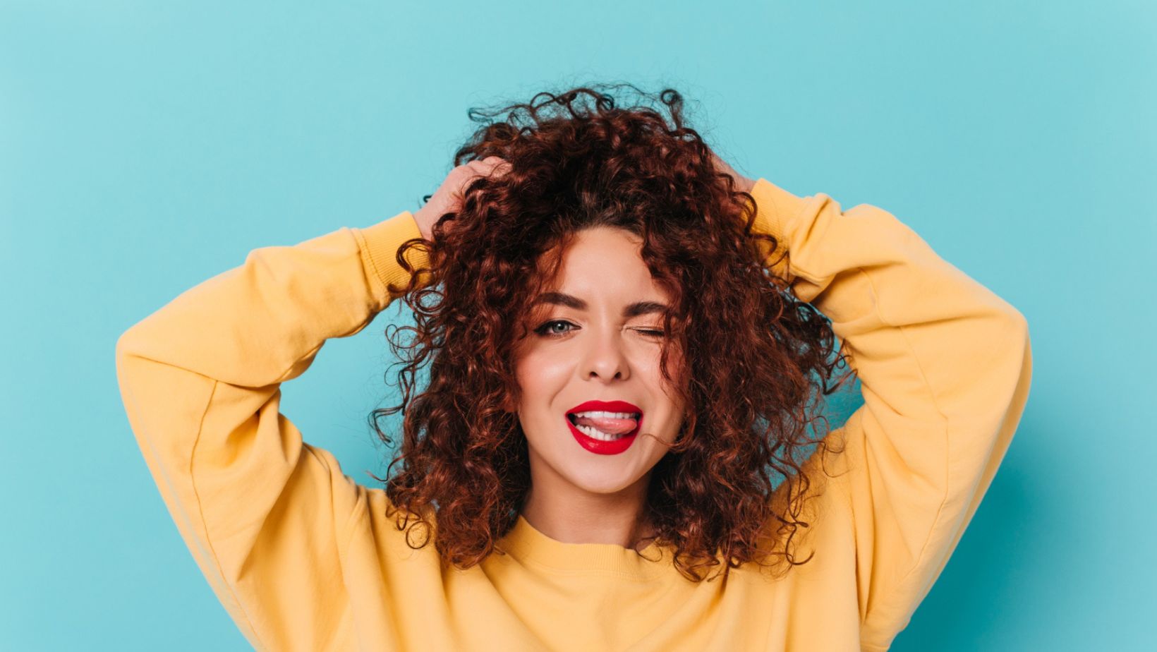 A woman with curly hairs